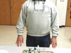 Al Burke, WB9SSE poses with the birthday cake he was presented during the Nov. 2015 FWRC general meeting