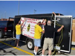 Fort Wayne Radio Club members prepare their exhibit at the annual Safety Fair at Jefferson Pointe shopping center